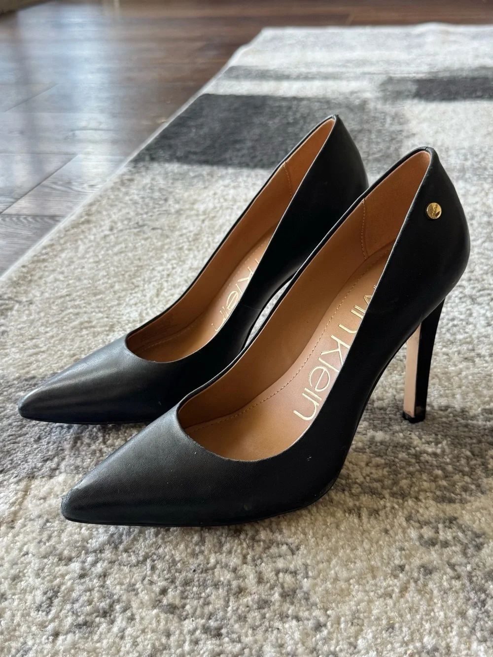 Calvin Klein Black Pointed-Toe Stiletto Pumps with Gold Accent